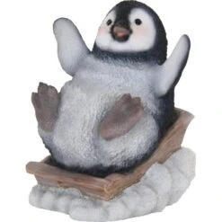 Deko-Figur Lustiger Pinguin Auf Schlitten 14 Cm